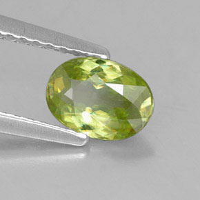 0.76캐럿 천연 골든 그린 스펜(티타나이트), 타원형 컷, 6.9×5 mm, VS