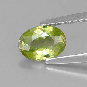 0.76캐럿 천연 골든 그린 스펜(티타나이트), 타원형 컷, 6.9×5 mm, VS