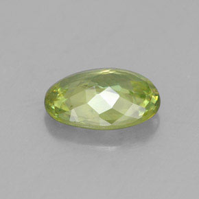 0.76캐럿 천연 골든 그린 스펜(티타나이트), 타원형 컷, 6.9×5 mm, VS