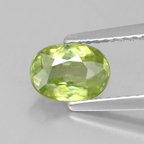 1.07캐럿 천연 골든 그린 스펜(티타나이트), 타원형 컷, 7.1×5.2 mm, VVS-VS