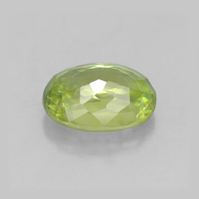 1.07캐럿 천연 골든 그린 스펜(티타나이트), 타원형 컷, 7.1×5.2 mm, VVS-VS