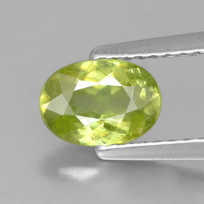 0.88캐럿 천연 골든 그린 스펜(티타나이트), 타원형 컷, 7.1×5 mm, VS