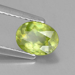 0.81캐럿 천연 골든 그린 스펜(티타나이트), 타원형 컷, 6.7×5 mm, VS