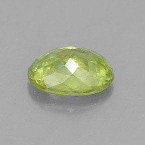 0.81캐럿 천연 골든 그린 스펜(티타나이트), 타원형 컷, 6.7×5 mm, VS