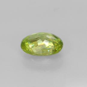 0.85캐럿 천연 골든 그린 스펜(티타나이트), 타원형 컷, 6.9×5.2 mm, VS