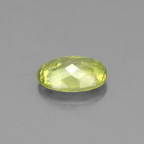 0.83캐럿 천연 골든 그린 스펜(티타나이트), 타원형 컷, 7×5 mm, VS