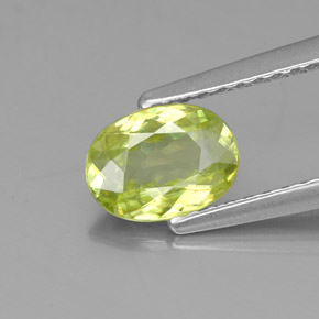 0.81캐럿 천연 골든 그린 스펜(티타나이트), 타원형 컷, 7×5.1 mm, VS