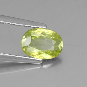 0.81캐럿 천연 골든 그린 스펜(티타나이트), 타원형 컷, 7×5.1 mm, VS
