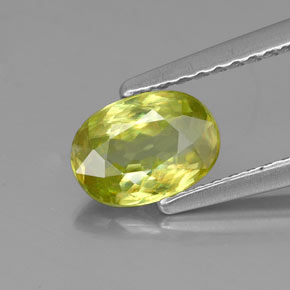 0.85캐럿 천연 골든 그린 스펜(티타나이트), 타원형 컷, 7.1×5.1 mm, VS