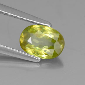 0.85캐럿 천연 골든 그린 스펜(티타나이트), 타원형 컷, 7.1×5.1 mm, VS