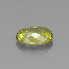 0.85캐럿 천연 골든 그린 스펜(티타나이트), 타원형 컷, 7.1×5.1 mm, VS