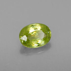 1.05캐럿 천연 골든 그린 스펜(티타나이트), 타원형 컷, 7.1×5.2 mm, VS