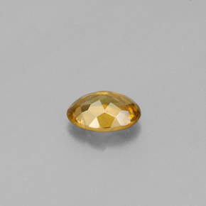 0.53캐럿 천연 골든 옐로우 스펜(티타나이트), 타원형 컷, 5.9×4.7 mm, VVS-VS
