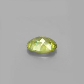 0.85캐럿 천연 골든 그린 스펜(티타나이트), 타원형 컷, 7×5.1 mm, VS-SI