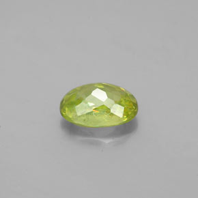 1.10캐럿 천연 골든 그린 스펜(티타나이트), 타원형 컷, 7.3×5.2 mm, VS-SI
