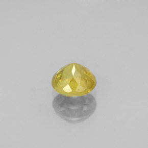 0.80캐럿 천연 골든 그린 스펜(티타나이트), 라운드 컷, 5.57 mm, SI