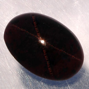 3.87캐럿 천연 붉은빛 블랙 스타 가넷, 타원형 컷, 10.6×7.2 mm, 투명한