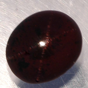 5.02캐럿 천연 붉은빛 블랙 스타 가넷, 타원형 컷, 9.5×8 mm, 투명한