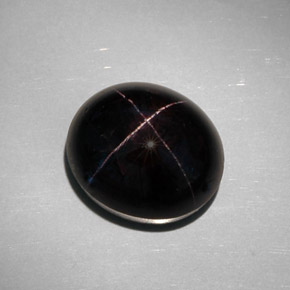 35.68캐럿 천연 붉은빛 블랙 스타 가넷, 타원형 컷, 17.6×15.3 mm, 불투명체