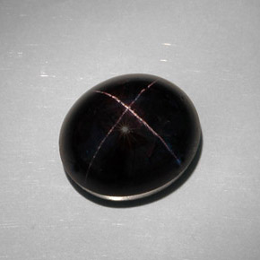 35.68캐럿 천연 붉은빛 블랙 스타 가넷, 타원형 컷, 17.6×15.3 mm, 불투명체
