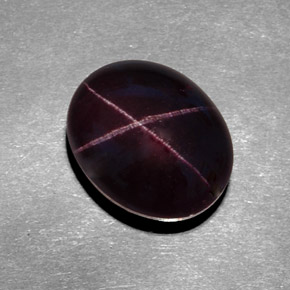 12.20캐럿 천연 블랙 레드 스타 가넷, 타원형 컷, 13.3×10.7 mm, 불투명체
