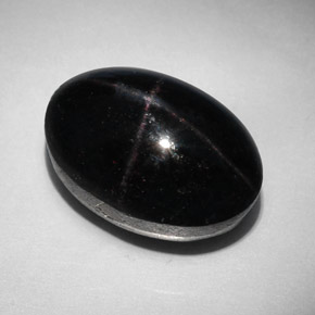 31.96캐럿 천연 붉은빛 블랙 스타 가넷, 타원형 컷, 18.4×12.5 mm, 불투명체