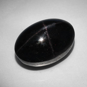 31.96캐럿 천연 붉은빛 블랙 스타 가넷, 타원형 컷, 18.4×12.5 mm, 불투명체