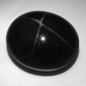 52.94캐럿 천연 붉은빛 블랙 스타 가넷, 타원형 컷, 21.5×18.3 mm, 불투명체