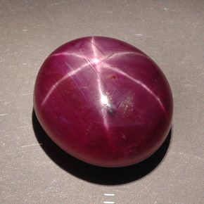 23.70캐럿 천연 보랏빛 레드 스타 루비, 타원형 컷, 16.1×14.1 mm, 불투명체