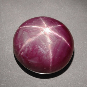 34.16캐럿 천연 보랏빛 레드 스타 루비, 타원형 컷, 17.6×16.6 mm, 불투명체