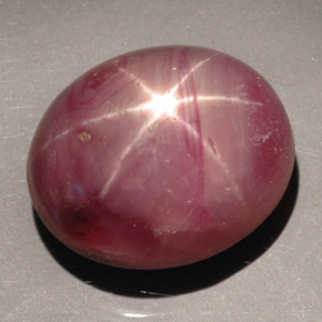36.27캐럿 천연 보랏빛 레드 스타 루비, 타원형 컷, 18.7×15.8 mm, 불투명체