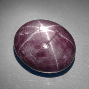 89.27캐럿 천연 보랏빛 레드 스타 루비, 타원형 컷, 26.1×21.7 mm, 불투명체