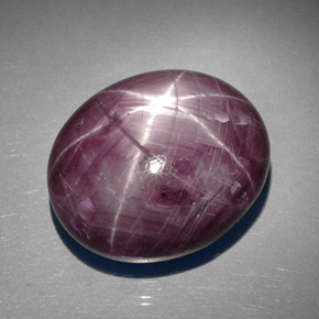 89.27캐럿 천연 보랏빛 레드 스타 루비, 타원형 컷, 26.1×21.7 mm, 불투명체