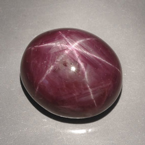 46.74캐럿 천연 보랏빛 레드 스타 루비, 타원형 컷, 19.9×17.1 mm, 불투명체