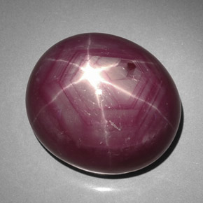 50.61캐럿 천연 보랏빛 레드 스타 루비, 타원형 컷, 20.3×17.6 mm, 불투명체