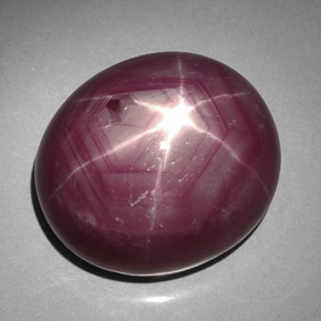 50.61캐럿 천연 보랏빛 레드 스타 루비, 타원형 컷, 20.3×17.6 mm, 불투명체