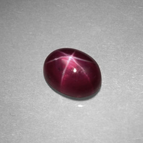 0.89캐럿 천연 보랏빛 레드 스타 루비, 타원형 컷, 5.9×4.6 mm, 불투명체