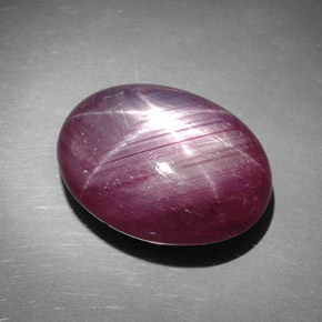 42.49캐럿 천연 보랏빛 레드 스타 루비, 타원형 컷, 22.9×17.1 mm, 불투명체