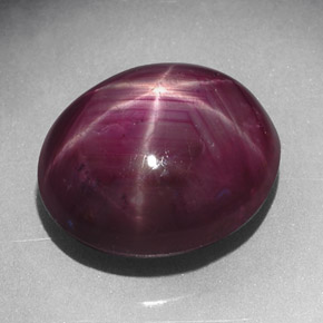 7.02캐럿 천연 보랏빛 레드 스타 루비, 타원형 컷, 11.6×10 mm, 불투명체