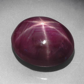 7.02캐럿 천연 보랏빛 레드 스타 루비, 타원형 컷, 11.6×10 mm, 불투명체
