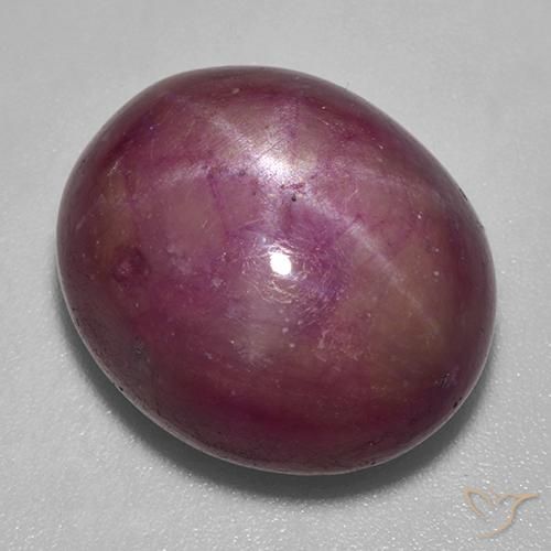 25.63ct 자연스러운 적자색 스타루비, 타원형, 불투명체