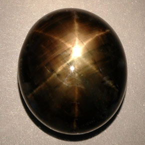 24.91캐럿 천연 검정색 스타 사파이어, 타원형 컷, 17.6×15.1 mm, 불투명체