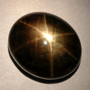 24.91캐럿 천연 검정색 스타 사파이어, 타원형 컷, 17.6×15.1 mm, 불투명체