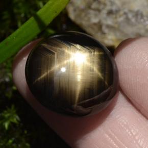 30.49캐럿 천연 검정색 스타 사파이어, 타원형 컷, 18.9×17.4 mm, 불투명체