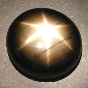 55.93캐럿 천연 검정색 스타 사파이어, 타원형 컷, 22.4×20.5 mm, 불투명체
