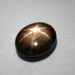 7.59캐럿 천연 검정색 스타 사파이어, 타원형 컷, 12.6×10.4 mm, 불투명체