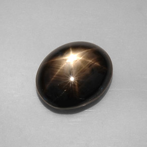 8.19캐럿 천연 검정색 스타 사파이어, 타원형 컷, 12.4×10.2 mm, 불투명체
