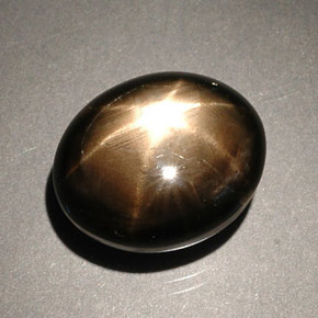 8.56캐럿 천연 검정색 스타 사파이어, 타원형 컷, 12.2×10.1 mm, 불투명체