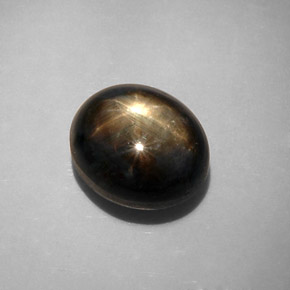12.34캐럿 천연 검정색 스타 사파이어, 타원형 컷, 12.2×10.4 mm, 불투명체