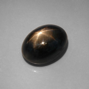 12.08캐럿 천연 검정색 스타 사파이어, 타원형 컷, 13.6×10.3 mm, 불투명체